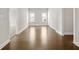 Living Room features hardwood floors and white trim at 631 Skytop Dr, Cumming, GA 30040