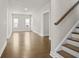 Living Room features hardwood floors, recessed lighting and stairs with wood railing at 631 Skytop Dr, Cumming, GA 30040