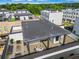 Aerial view of rooftop deck with outdoor seating in a modern townhome community at 1048 Claudette Colvin Ct, Atlanta, GA 30318