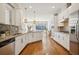 Beautiful kitchen featuring stainless appliances, sleek cabinets, granite countertops and an island at 1199 Huff Nw Rd # 127, Atlanta, GA 30318