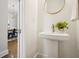Chic powder room featuring modern fixtures, stylish mirror, and tasteful decor at 1199 Huff Nw Rd # 127, Atlanta, GA 30318