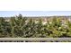 Panoramic view framed by lush green trees, offering privacy and beauty at 1199 Huff Nw Rd # 127, Atlanta, GA 30318