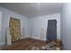 Bare bedroom with unfinished flooring and pastel walls at 1809 San Gabriel Ave, Decatur, GA 30032