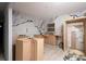 A view of an unfinished kitchenette with marble-patterned wall paper at 1809 San Gabriel Ave, Decatur, GA 30032