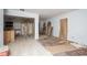 Open concept room featuring light walls and unfinished flooring at 1809 San Gabriel Ave, Decatur, GA 30032