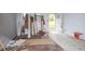 Bright, airy living room with light walls and unfinished wood floors at 1809 San Gabriel Ave, Decatur, GA 30032