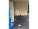 View from doorway into neglected room showing damaged door, wall, and floor at 2168 Clanton Ter, Decatur, GA 30034
