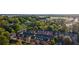 Charming aerial view of multiple townhomes nestled amongst lush green trees at 2767 Durham Ne Dr, Atlanta, GA 30319