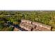 Beautiful aerial view of townhomes with green trees and the city skyline in the background at 2767 Durham Ne Dr, Atlanta, GA 30319
