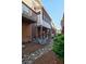 Backyard of townhome featuring an enclosed patio with an abundance of rocks and mulch at 2767 Durham Ne Dr, Atlanta, GA 30319