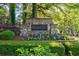 Stone entrance sign reading 'Dresden Creek' with landscaping, creating a welcoming feel at 2767 Durham Ne Dr, Atlanta, GA 30319