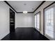 Bright dining area featuring hardwood floors, modern lighting, and french doors at 2767 Durham Ne Dr, Atlanta, GA 30319