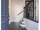 Entryway of a home featuring hardwood floors and staircase with decorative iron railing at 2767 Durham Ne Dr, Atlanta, GA 30319