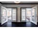 Open French doors leading to a balcony with black railings at 2767 Durham Ne Dr, Atlanta, GA 30319