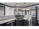 Kitchen with white marble countertops, black cabinets, and a stainless steel dishwasher at 2767 Durham Ne Dr, Atlanta, GA 30319