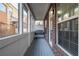 Cozy porch with a swing, brick exterior, and plenty of natural light, perfect for relaxation at 2767 Durham Ne Dr, Atlanta, GA 30319