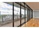 Expansive windows and door to large balcony with a fantastic city view at 750 Park Ne Ave # 13E, Atlanta, GA 30326