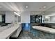 Elegant bathroom featuring marble countertops, soaking tub, a glass shower, and ample lighting at 750 Park Ne Ave # 13E, Atlanta, GA 30326