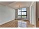 Living area with hardwood floors, chandelier, and large windows at 750 Park Ne Ave # 13E, Atlanta, GA 30326