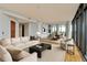 Bright and airy living room with modern furnishings and a dining area, perfect for entertaining at 750 Park Ne Ave # 13E, Atlanta, GA 30326