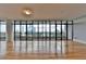 Bright and airy living space with floor-to-ceiling windows offering stunning city views at 750 Park Ne Ave # 13E, Atlanta, GA 30326