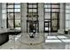 An elegant lobby featuring marble floors, modern furniture, and lots of natural light at 750 Park Ne Ave # 13E, Atlanta, GA 30326