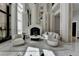 Elegant lobby featuring a fireplace, plush seating, and modern design at 750 Park Ne Ave # 13E, Atlanta, GA 30326