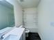 Bathroom featuring a shower-tub combo and a single sink vanity at 7744 Sudbury Cir, Covington, GA 30014