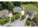 Aerial view of this two-story brick home in a well-manicured neighborhood with mature landscaping at 2788 Bridle Ridge Way, Buford, GA 30519