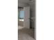 Bathroom showcases a soaking tub and built-in shelving at 2788 Bridle Ridge Way, Buford, GA 30519