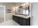 Bathroom featuring granite topped double vanity with tile floors and storage at 2788 Bridle Ridge Way, Buford, GA 30519