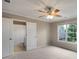Carpeted bedroom with ensuite bathroom featuring tub-shower combo at 2788 Bridle Ridge Way, Buford, GA 30519