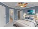 Bedroom with blue walls, neutral carpet and ensuite bathroom at 2788 Bridle Ridge Way, Buford, GA 30519