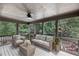 Comfortable screened porch with ceiling fan and outdoor furniture at 2788 Bridle Ridge Way, Buford, GA 30519