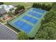 Aerial view of well-maintained community tennis courts surrounded by trees and next to a playground at 2788 Bridle Ridge Way, Buford, GA 30519