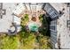 Aerial view of the community featuring a refreshing pool, courtyard, and lush landscaping at 11 Perimeter E Ctr # 1404, Atlanta, GA 30346