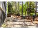 Well-maintained dog park featuring pet waste station and seating for resident convenience at 11 Perimeter E Ctr # 1404, Atlanta, GA 30346
