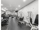 Modern gym with various exercise machines, weights, and plenty of open space for workouts at 11 Perimeter E Ctr # 1404, Atlanta, GA 30346