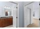 Hallway displaying a doorway to a bathroom and another to a bedroom at 11 Perimeter E Ctr # 1404, Atlanta, GA 30346