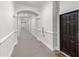 Long hallway with carpet and architectural detail, leading to unit 1404 at 11 Perimeter E Ctr # 1404, Atlanta, GA 30346