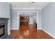 Living room boasts hardwood floors with a view of the open kitchen and breakfast nook at 11 Perimeter E Ctr # 1404, Atlanta, GA 30346