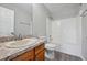 Bathroom with shower-tub combination and wood-look flooring at 1575 April Ln, Morrow, GA 30260