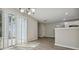 Dining area next to sliding glass doors, opens to kitchen with stainless steel appliances at 1575 April Ln, Morrow, GA 30260