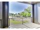 Balcony view of grassy area, trees, and neighborhood at 2620 Mackintosh Ct # 19, Brookhaven, GA 30319