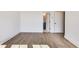 A bright bedroom with hardwood floors, and a view into the ensuite bathroom at 2620 Mackintosh Ct # 19, Brookhaven, GA 30319