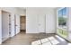 Bright bedroom with a large window and hardwood floors at 2620 Mackintosh Ct # 19, Brookhaven, GA 30319
