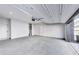 Bright, white walled garage with a concrete floor and open door at 2620 Mackintosh Ct # 19, Brookhaven, GA 30319