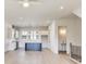 Open-concept kitchen showing large island, recessed lighting, and stainless steel appliances at 2620 Mackintosh Ct # 19, Brookhaven, GA 30319
