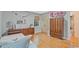 Charming bedroom with hardwood floors, a large dresser, and built-in closet for ample storage at 3658 Brock Rd, Duluth, GA 30096