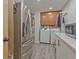Well-organized laundry room with stainless steel appliances, ample storage, and modern design at 3658 Brock Rd, Duluth, GA 30096